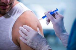 female-doctor-giving-female-doctor-giving-injection-patient-Exosome-injection-patient